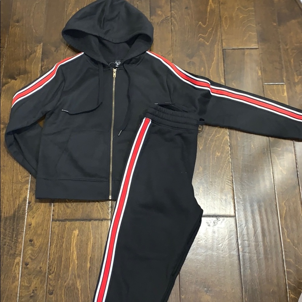 Matching zip-up and sweatpants outfit